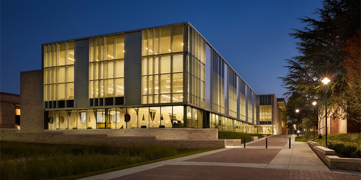 Exterior of AACC's Truxal Library at night.